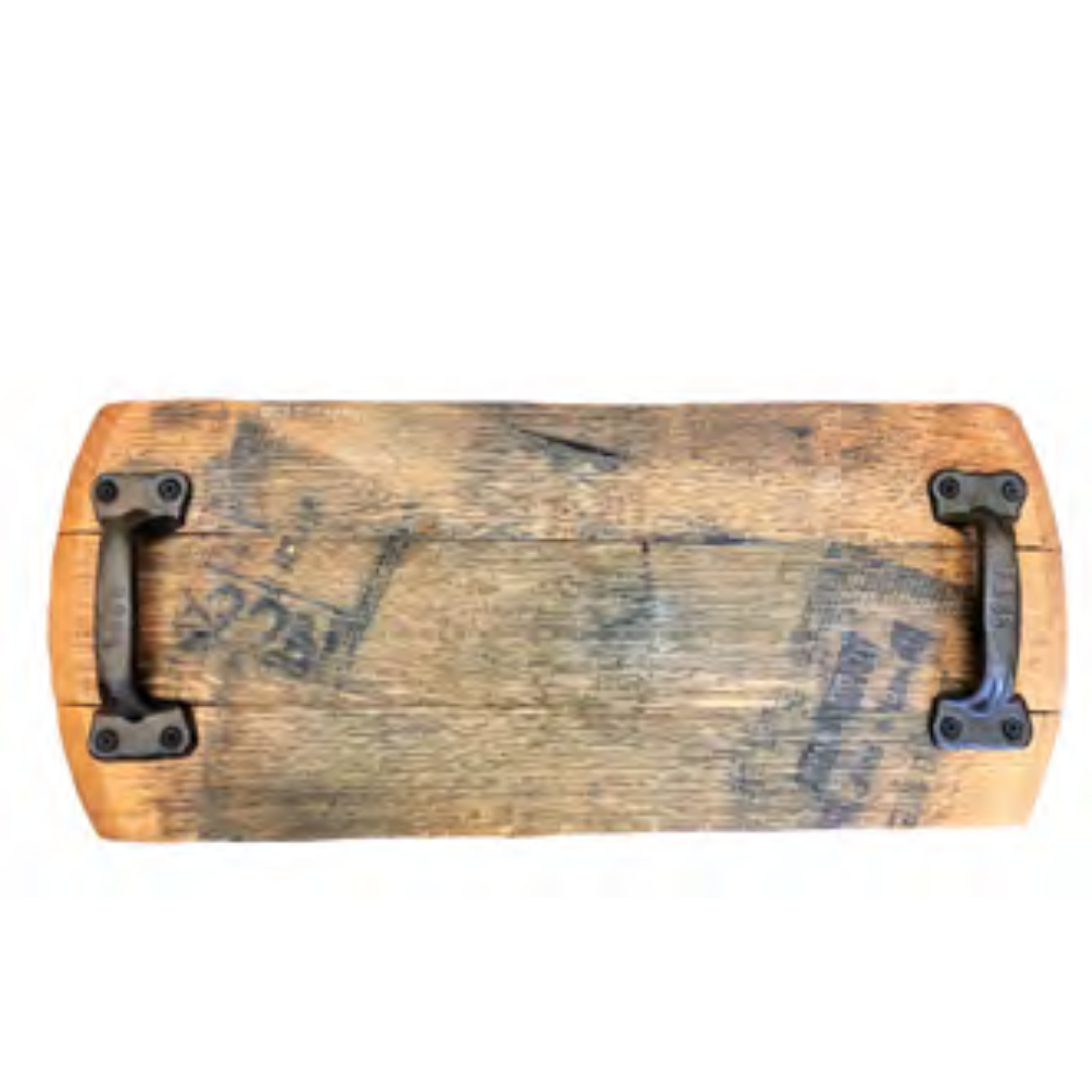 Blank whiskey barrel head serving tray with cast iron handles on white background