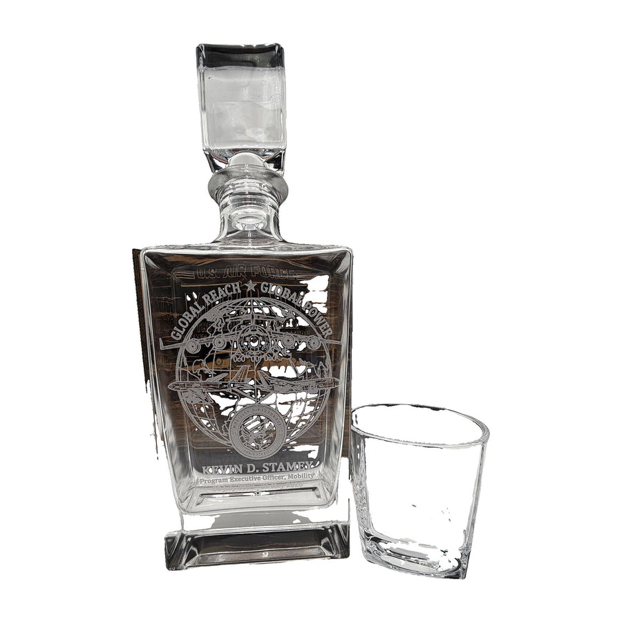 Personalized engraved whiskey decanter and glass on white